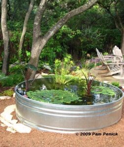 How to make a container pond in a stock tank - Digging