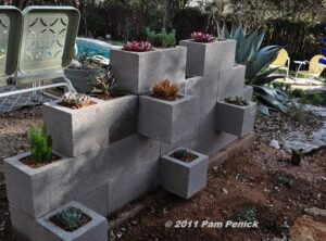 Cinderblock succulent wall deconstruction - Digging