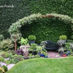 Taming a hillside with terraces and sculpture in Bonnie Berk's garden