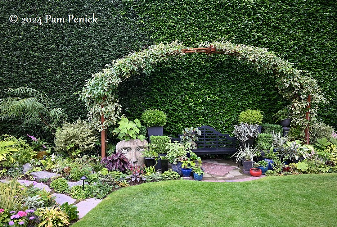 Taming a hillside with terraces and sculpture in Bonnie Berk's garden